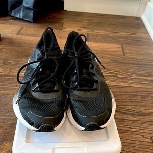 Lulu lemon size 8 black sneakers barely worn.  Bought wrong size.
